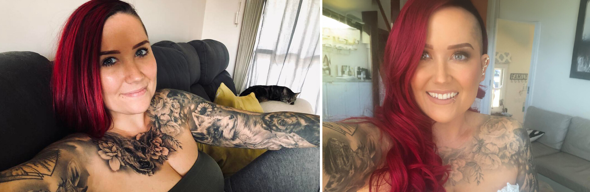 A person with vibrant red hair and detailed tattoos smiles, sitting on a couch with a cat in the background.
