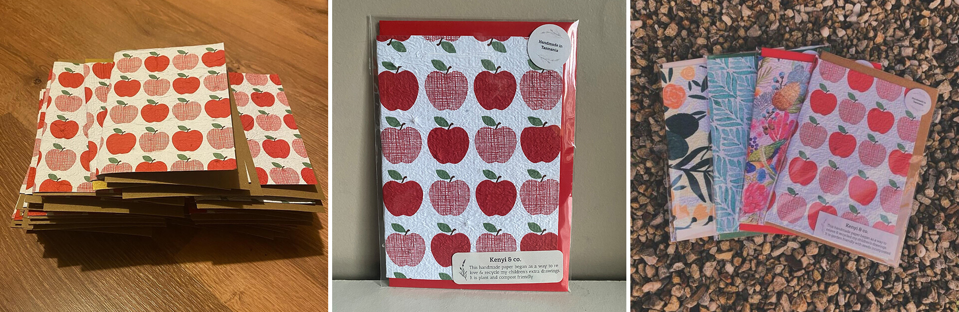 A stack of handmade cards with red apple patterns, some in packaging, displayed on a textured surface.