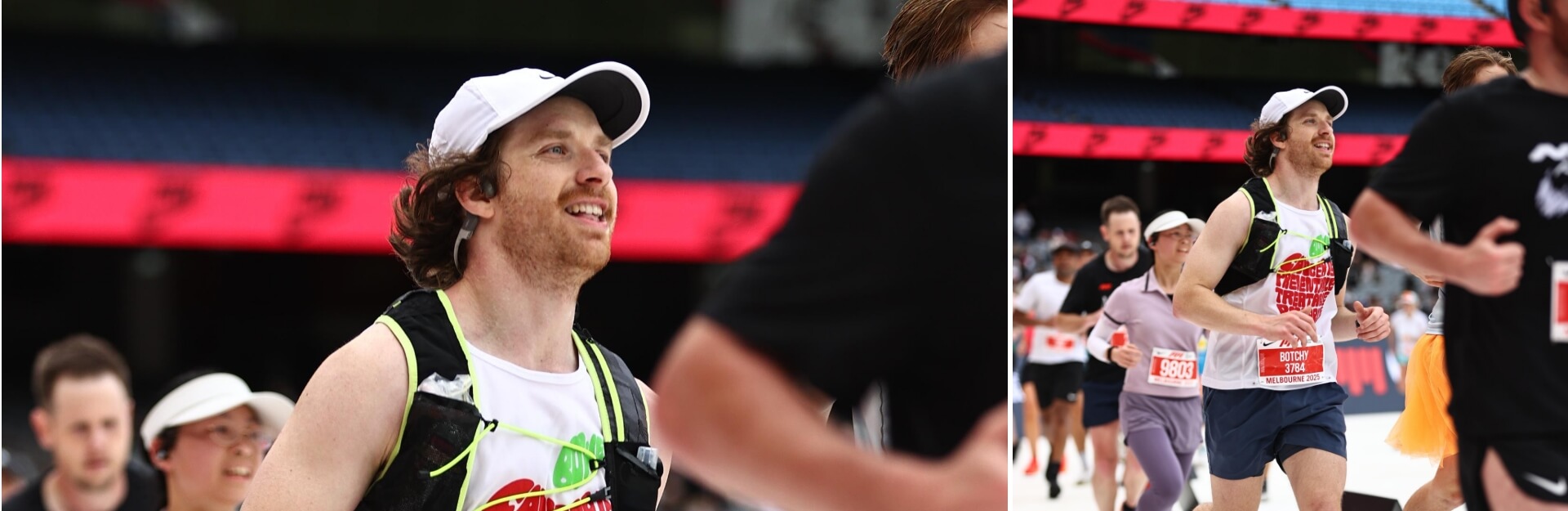 A group of runners in a race, with one man in a white cap smiling and wearing a race bib and hydration vest.