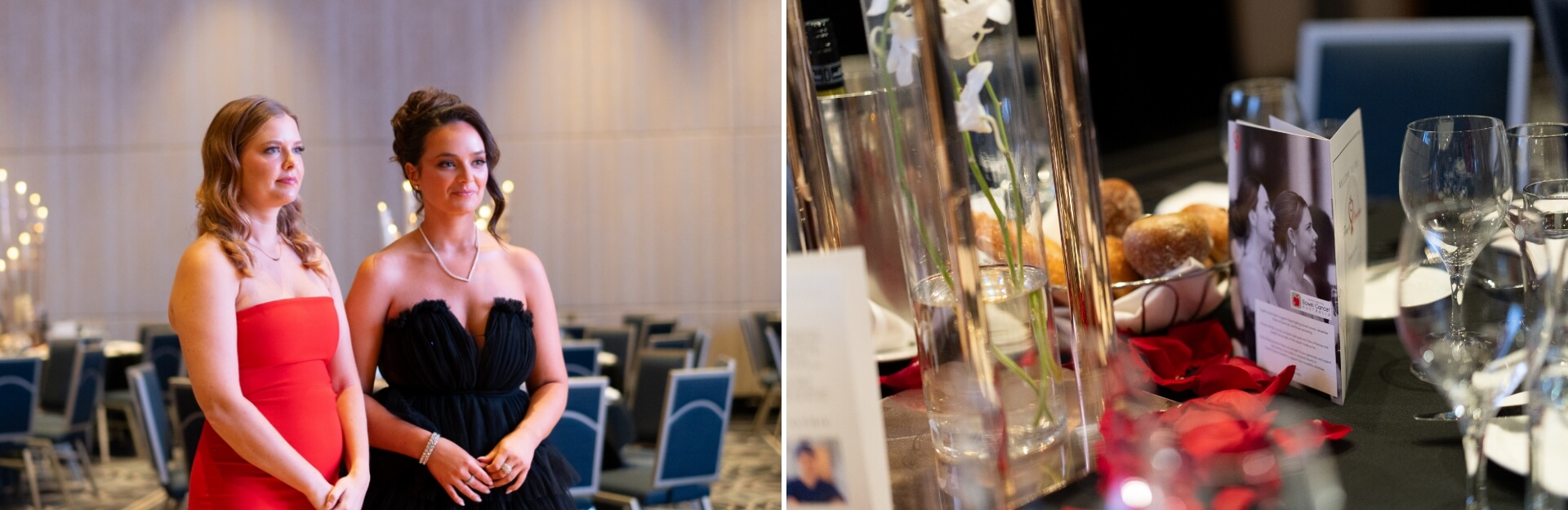 Two women in formal dresses stand together in an event space, with tables set elegantly in the background.