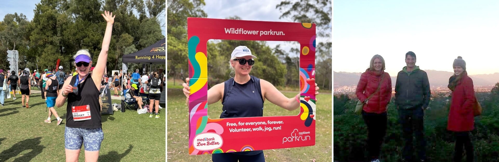 A woman holds a medal at a running event, surrounded by participants and a banner for Wildflower parkrun.